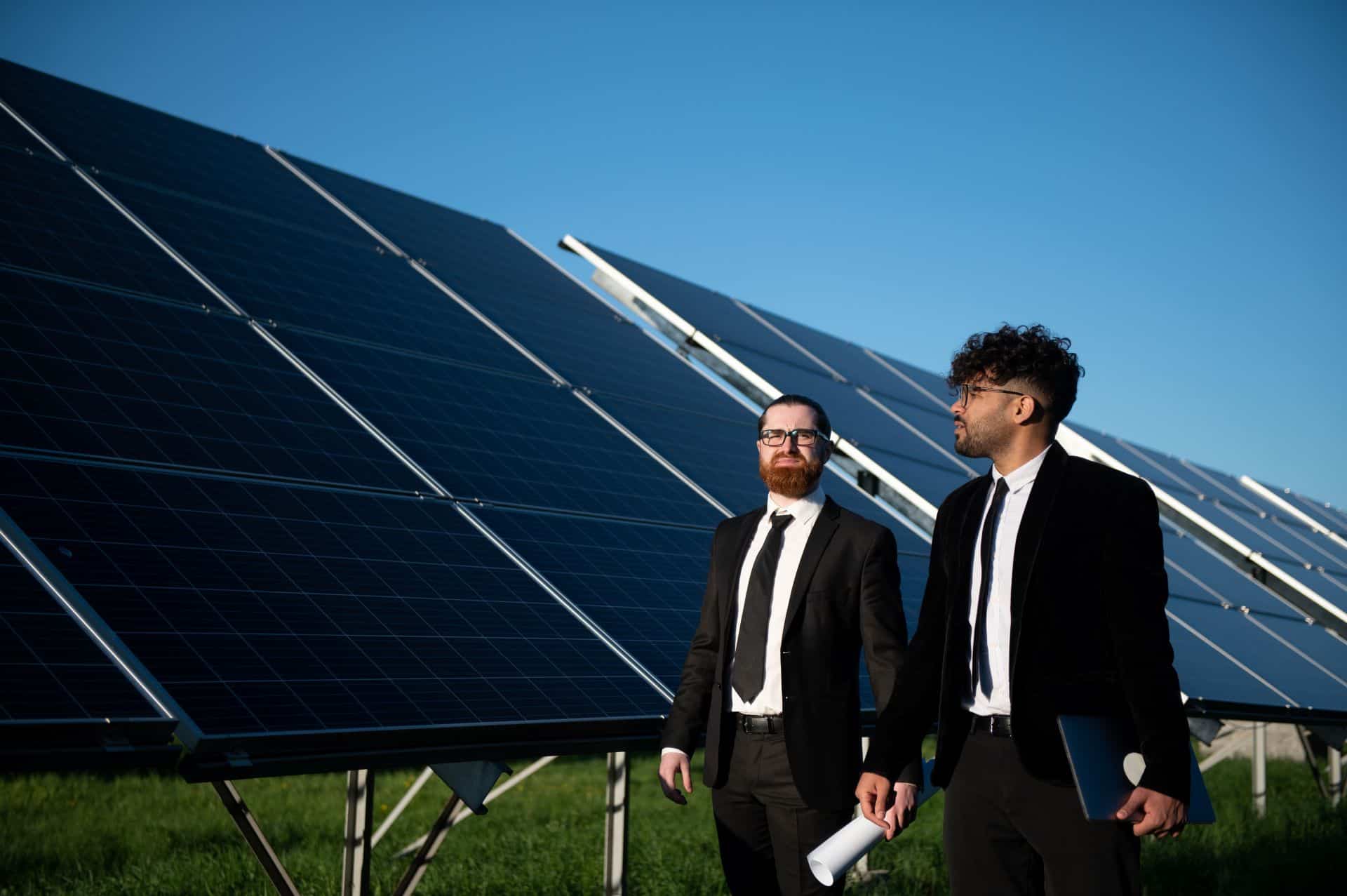 Solar power installation with professionals in a residential setting.