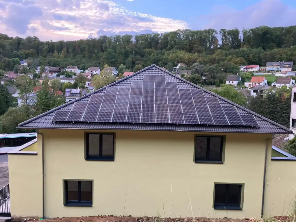 Solar panel installation on residential roof in Sachsen-Anhalt, Germany.
