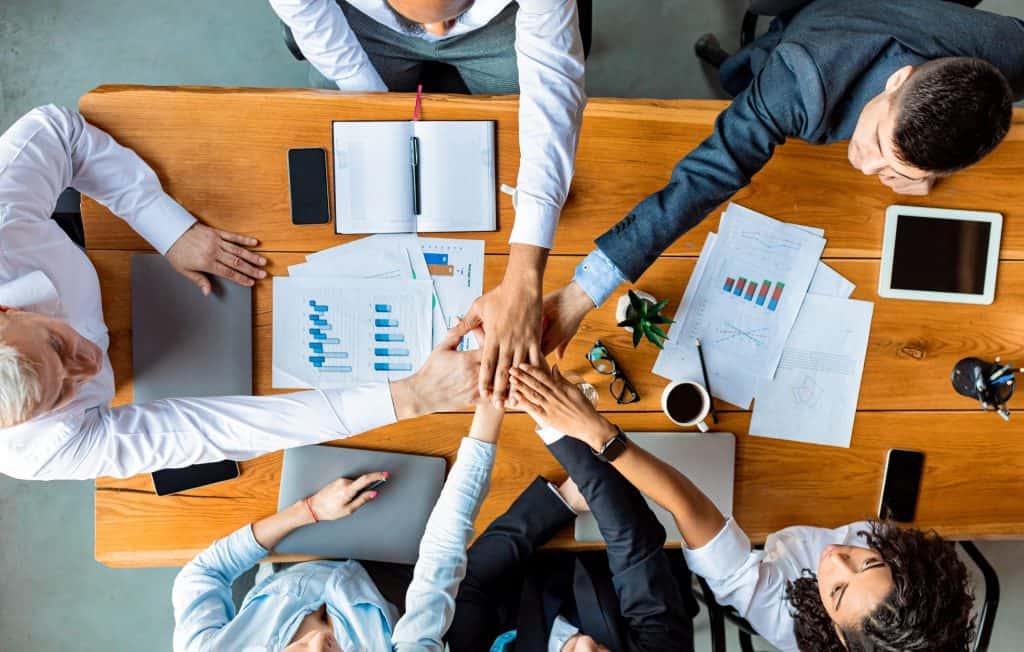 Community membership explained: team members collaborating over project plans and documents.