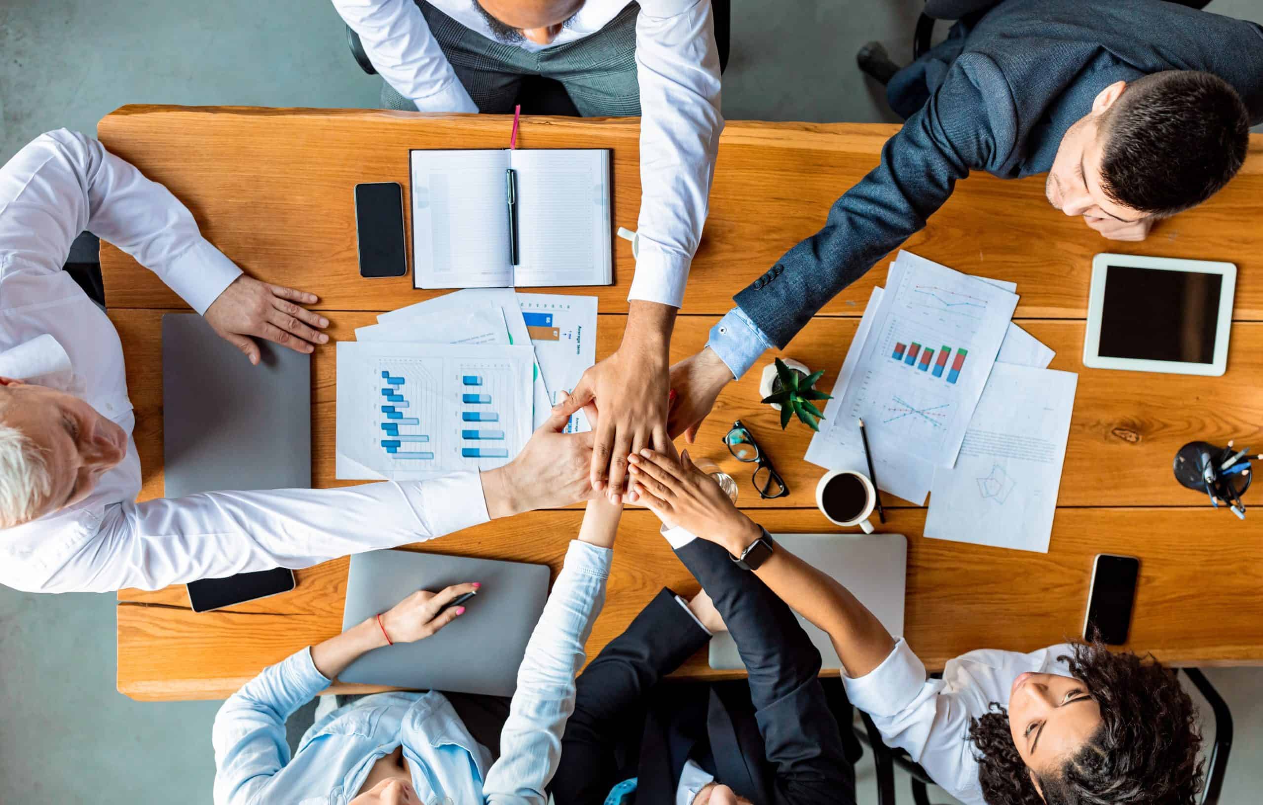 Community membership explained: team members collaborating over project plans and documents.